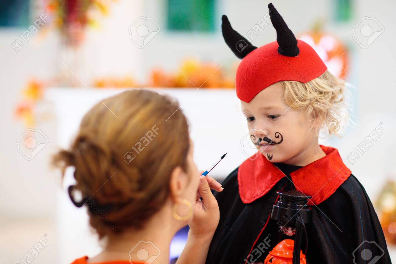 Child And Mother In Halloween Costume Kids Trick Or Treat Face