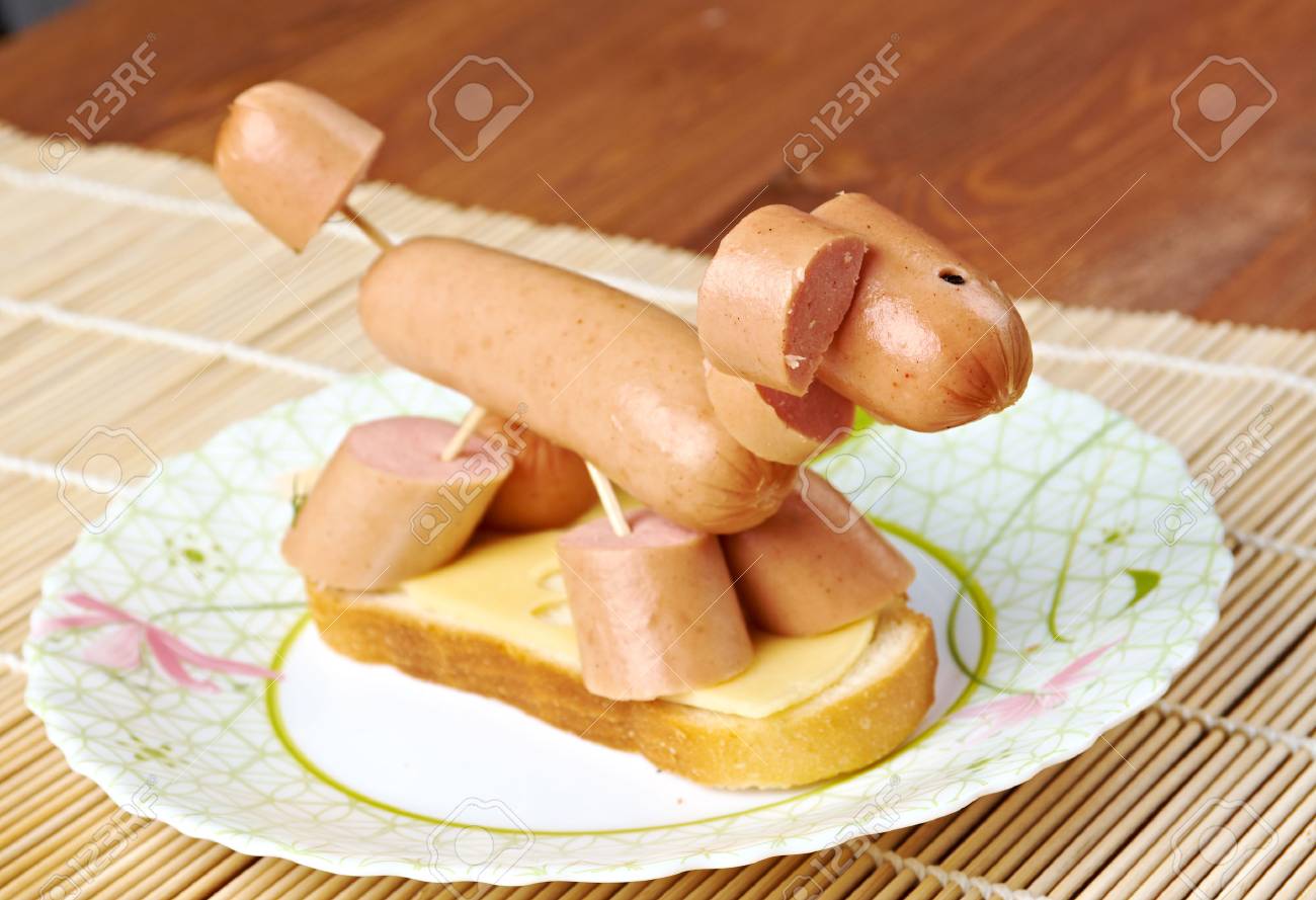 Hilo para dar los buenos días - Página 8 27858767-desayuno-para-el-ni%C3%B1o-s%C3%A1ndwich-hecho-de-salchichas-para-perros