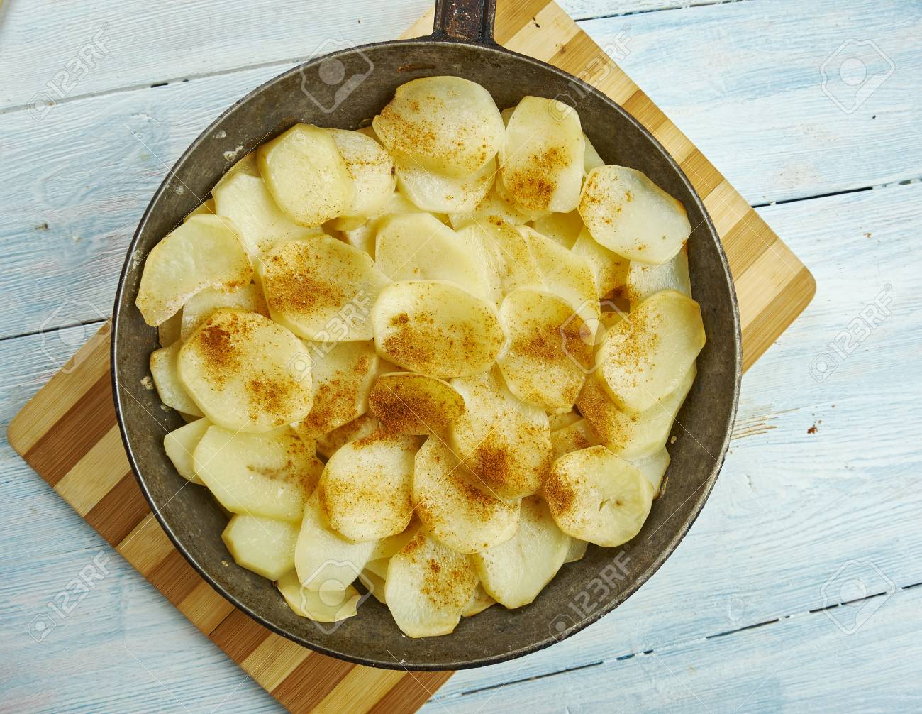 Welsh Onion Cake Layers Of Sliced Potatoes And Soft Onions Cooked Stock Photo Picture And Royalty Free Image Image 112271741