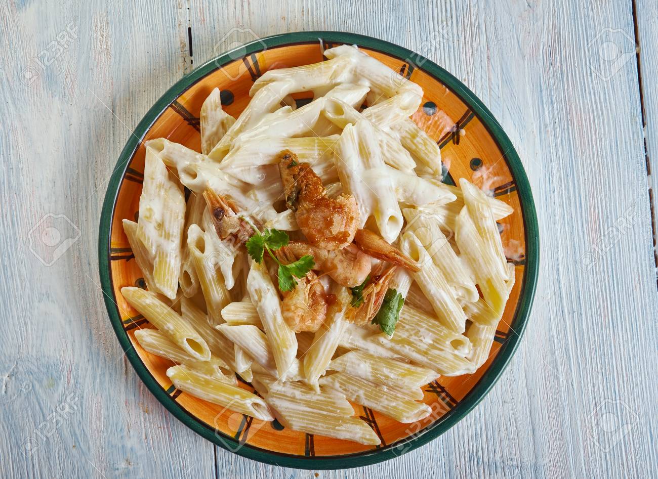 Shrimp Pasta With Creamy Mozzarella Sauce From Penne Pasta And Stock Photo Picture And Royalty Free Image Image 117643334