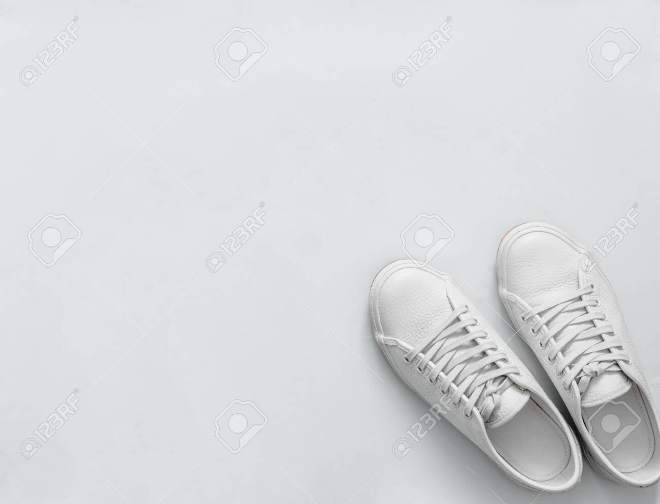 trendy white leather sneakers