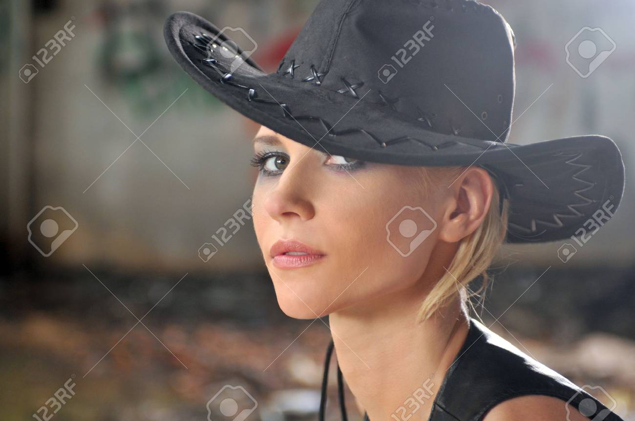 Woman wearing cowboy hat Clearance