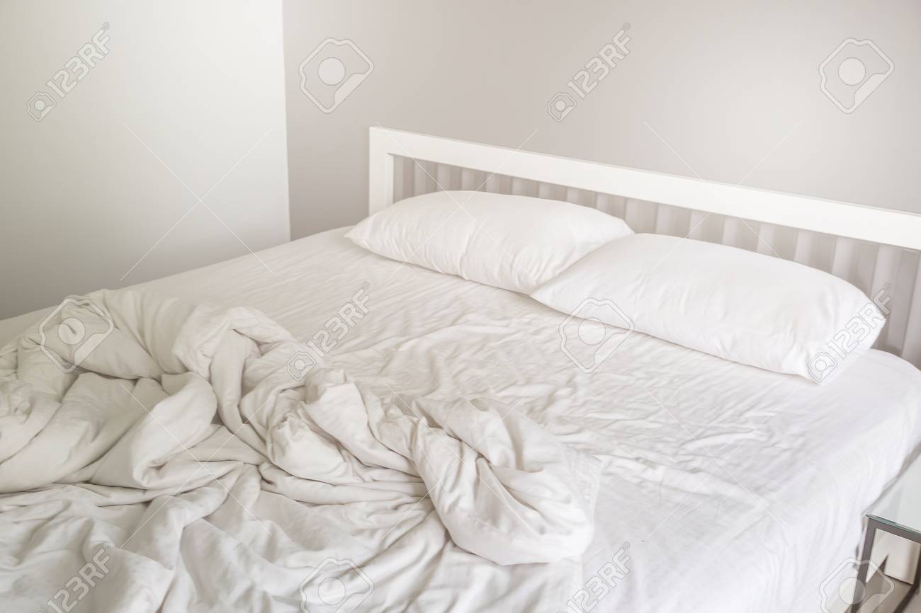 Two White Pillow On Bed With Wrinkle Messy Blanket In Bedroom Stock Photo Picture And Royalty Free Image Image 80765525