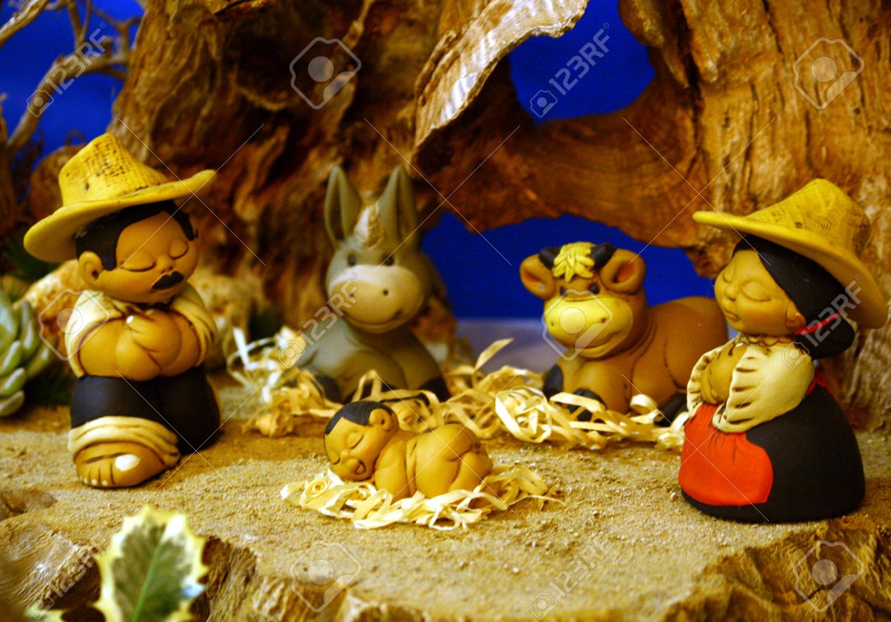 nativity with mexican holy family in a manger at christmas stock