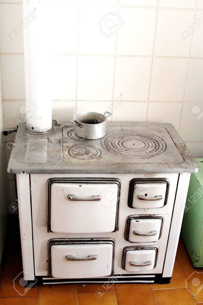 Antique Cast Iron Stove To Heat The House In Mountains Cold Days Of Antique Cast Iron Stove To Heat The House In Mountains Cold Days Of