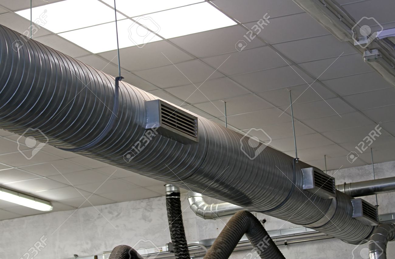 Metal Tube For The Air-conditioning Of A Large Industrial Complex Stock Photo - 27352519 Air Conditioning air conditioning tube. Metal Tube For The Air-conditioning Of A Large Industrial Complex Stock Photo - 27352519 Air Conditioning