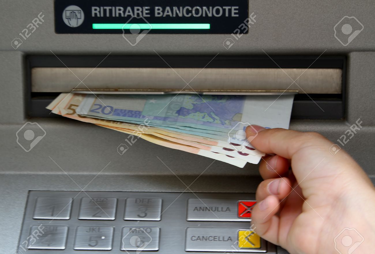 Withdraw Money In Banknotes From An ATM In Italy Stock Photo, Picture And Royalty Free Image. Image 29423761.