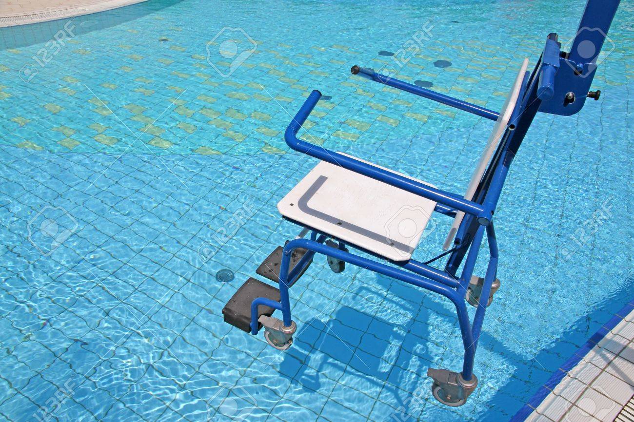wheelchair for the disabled for use in swimming pool stock photo