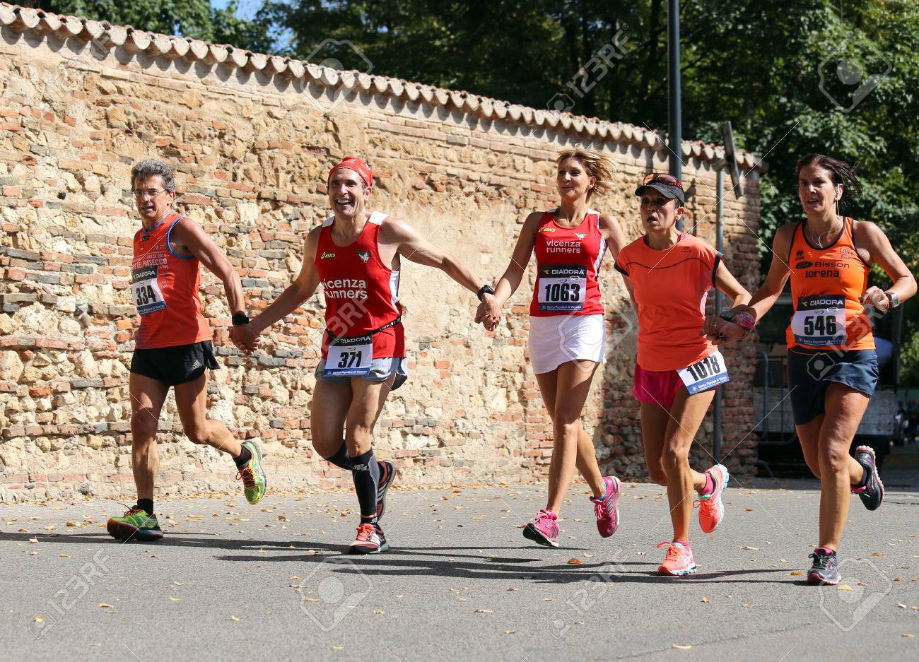 Vicenza, Italy. 20th September 2015. Marathon runners during the race called "Mezza di Vicenza" in city street of Vicenza in Northern Italy.The runners have raced meters 21097 - 45926202 Vicenza, Italy. 20th September 2015. Marathon runners during the race called "Mezza di Vicenza" in city street of Vicenza in Northern Italy.The runners have raced meters 21097 - 45926202