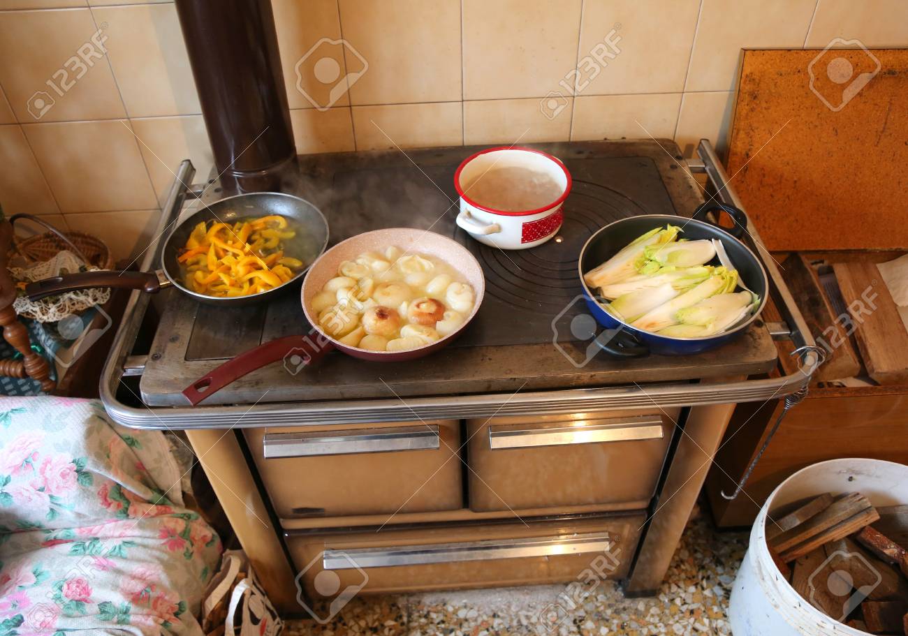 Old Wood Stove With Many Pot When Cooking Vegetables Using Dry Stock Photo Picture And Royalty Free Image Image 98969715