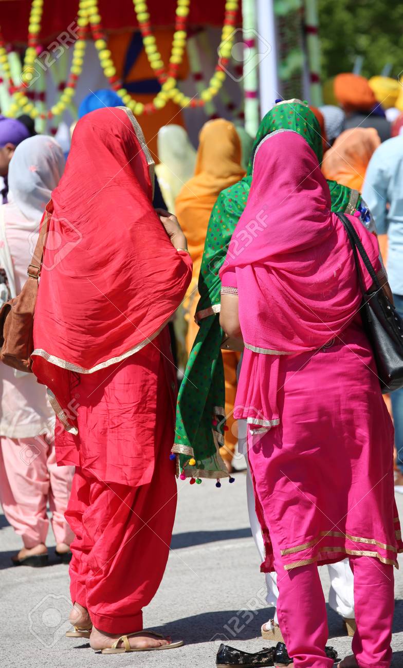 Two Young Sikh Women With Colored Dress In The Street Stock Photo, Picture  and Royalty Free Image. Image 102811556.