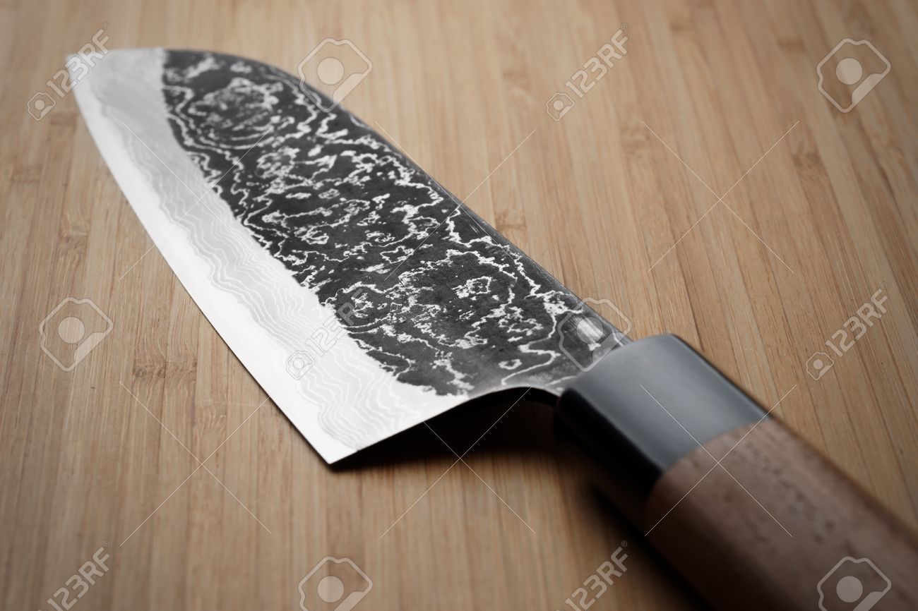 grungy image of damascus steel japanese kitchen knife stock photo grungy image of damascus steel japanese kitchen knife stock photo