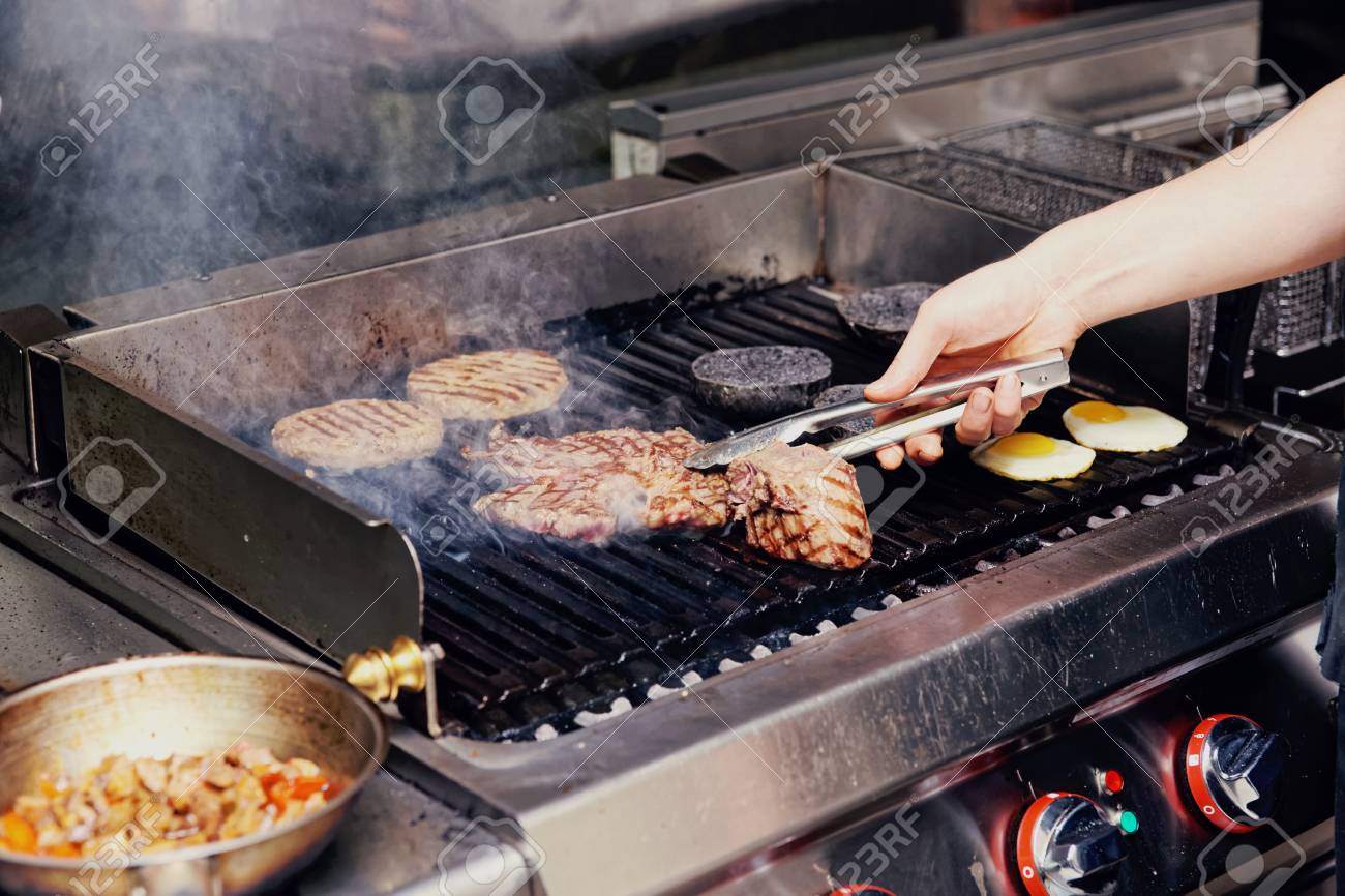 Real Kitchen Of Bar And Grill Restaurant In Operation Toned Stock Photo Picture And Royalty Free Image Image 66942677