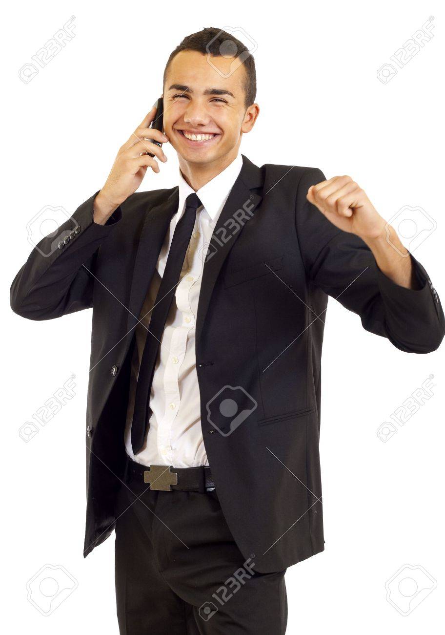 Exitoso Hombre De Negocios Sorprendido Con El Puno Cerrado Utilizando El Telefono Movil Celebrando Algunas Noticias Felices Fotos Retratos Imagenes Y Fotografia De Archivo Libres De Derecho Image