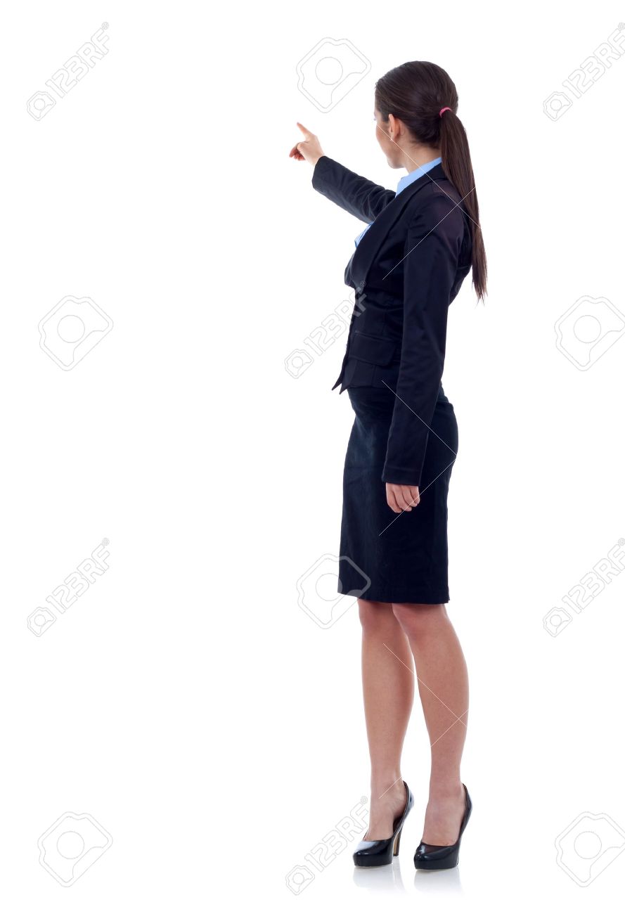 Business Woman Points Finger At Something In Her Back Isolated On White Background Stock Photo Picture And Royalty Free Image Image