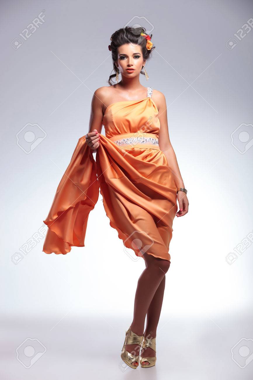 wife lifts her dress