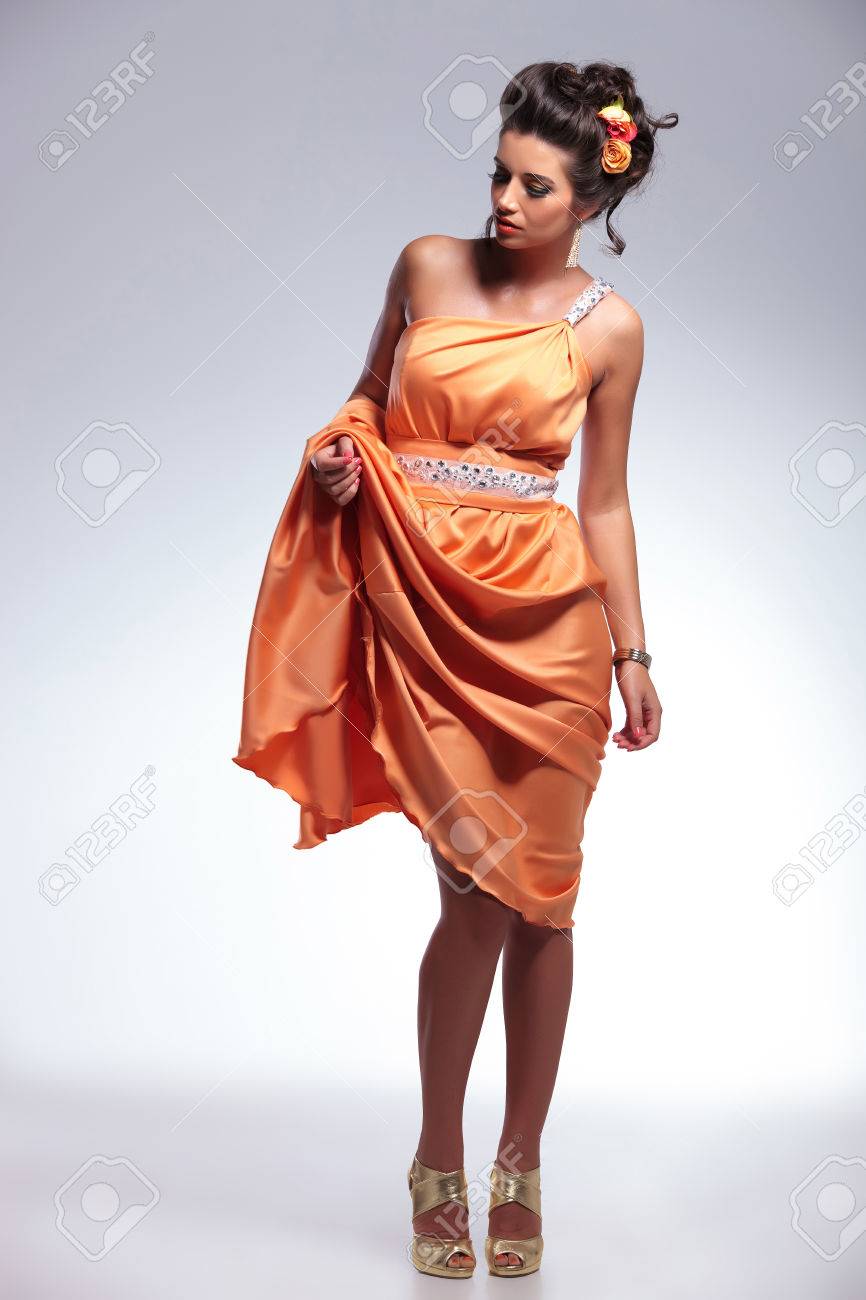 wife lifts her dress