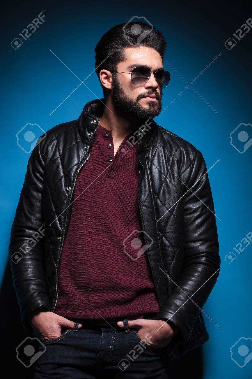 Side View Profile Of A Young Bearded Fashion Man In Leather Jacket And Sunglasses Standing With His Hands In Pockets Stock Photo Picture And Royalty Free Image Image