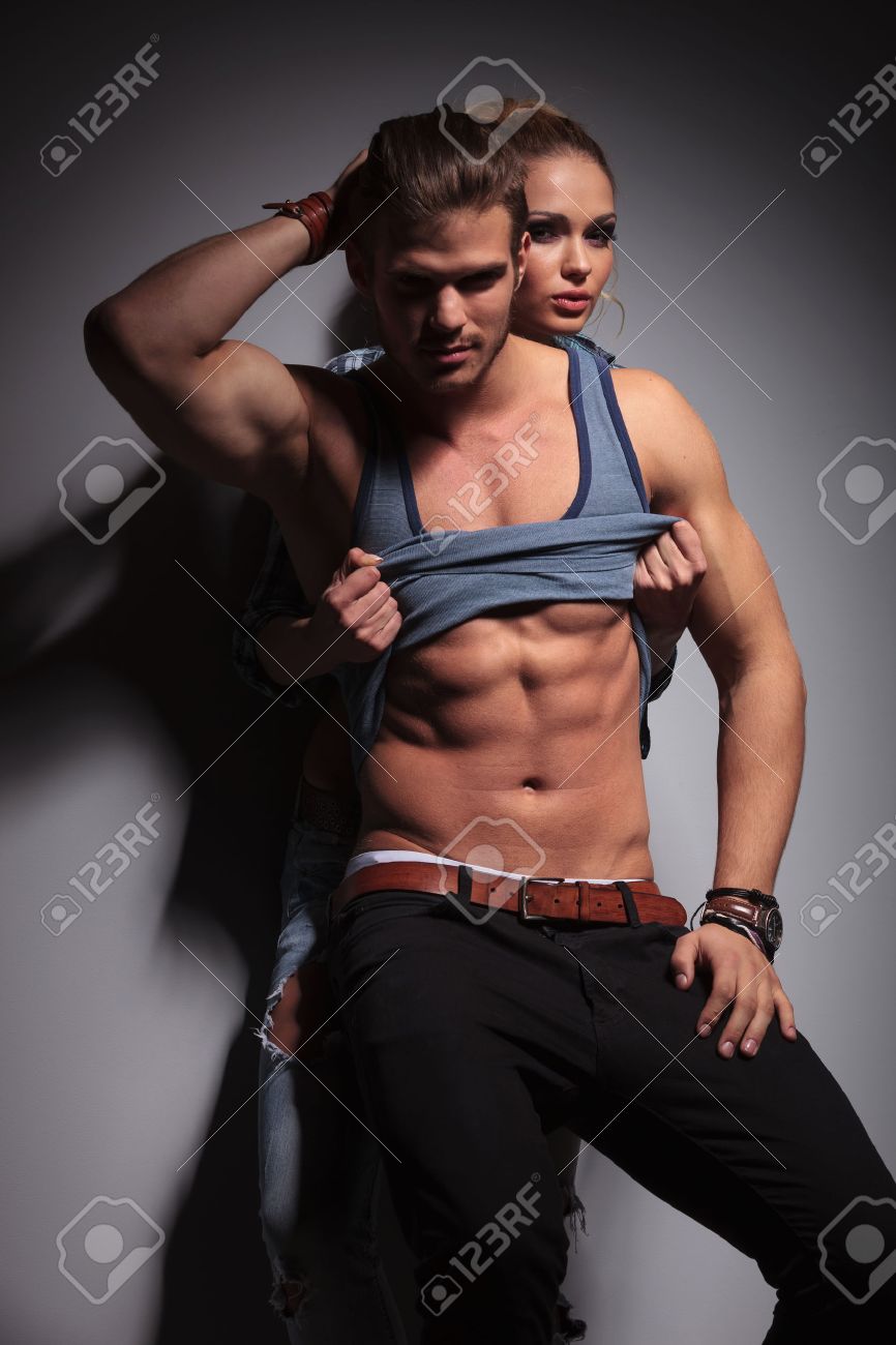 Sexy Man Fixing His Hair While His