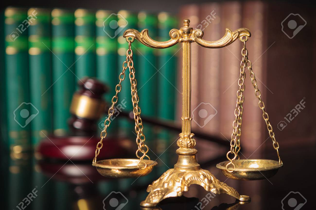 golden scale in front of judge's gavel and law books, justice concept - 51844693 golden scale in front of judge's gavel and law books, justice concept - 51844693