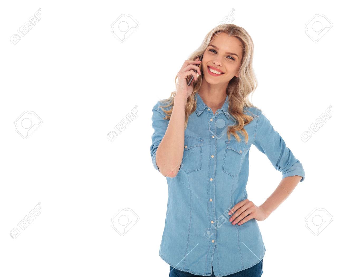 happy smiling blonde casual woman talking on the phone on white background - 64558628 happy smiling blonde casual woman talking on the phone on white background - 64558628