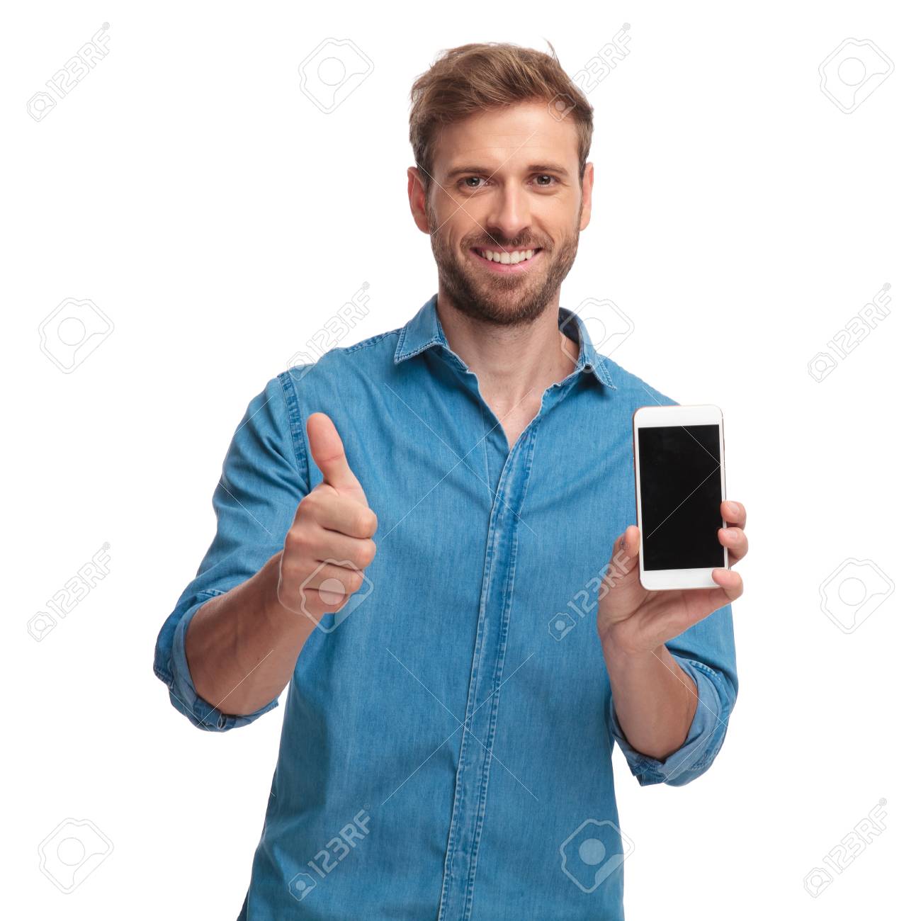 smiling casual man showing the blank screen of his phone and makes the ok sign on white background - 107378817 smiling casual man showing the blank screen of his phone and makes the ok sign on white background - 107378817