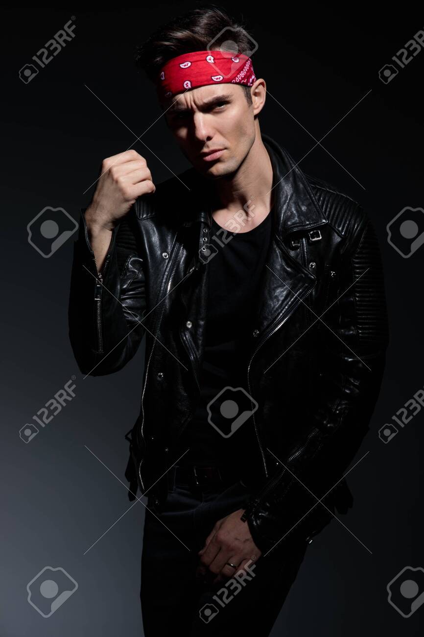 Cool Fashion Model Wearing Leather Jacket And Red Bandana Holding Stock Photo Picture And Royalty Free Image Image 130804094