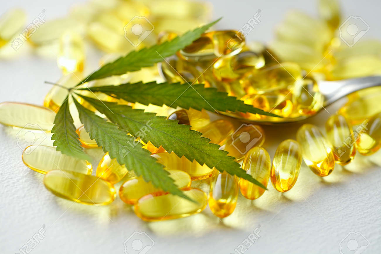 Cannabis Hemp Oil or CBD Oil Capsules, Food Organic Food Supplements. Alternative medicine concept. Cosmetics and skin care products - 169732024 Cannabis Hemp Oil or CBD Oil Capsules, Food Organic Food Supplements. Alternative medicine concept. Cosmetics and skin care products - 169732024