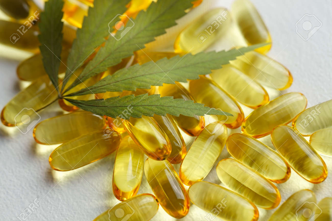 Cannabis Hemp Oil or CBD Oil Capsules, Food Organic Food Supplements. Alternative medicine concept. Cosmetics and skin care products - 169732240 Cannabis Hemp Oil or CBD Oil Capsules, Food Organic Food Supplements. Alternative medicine concept. Cosmetics and skin care products - 169732240