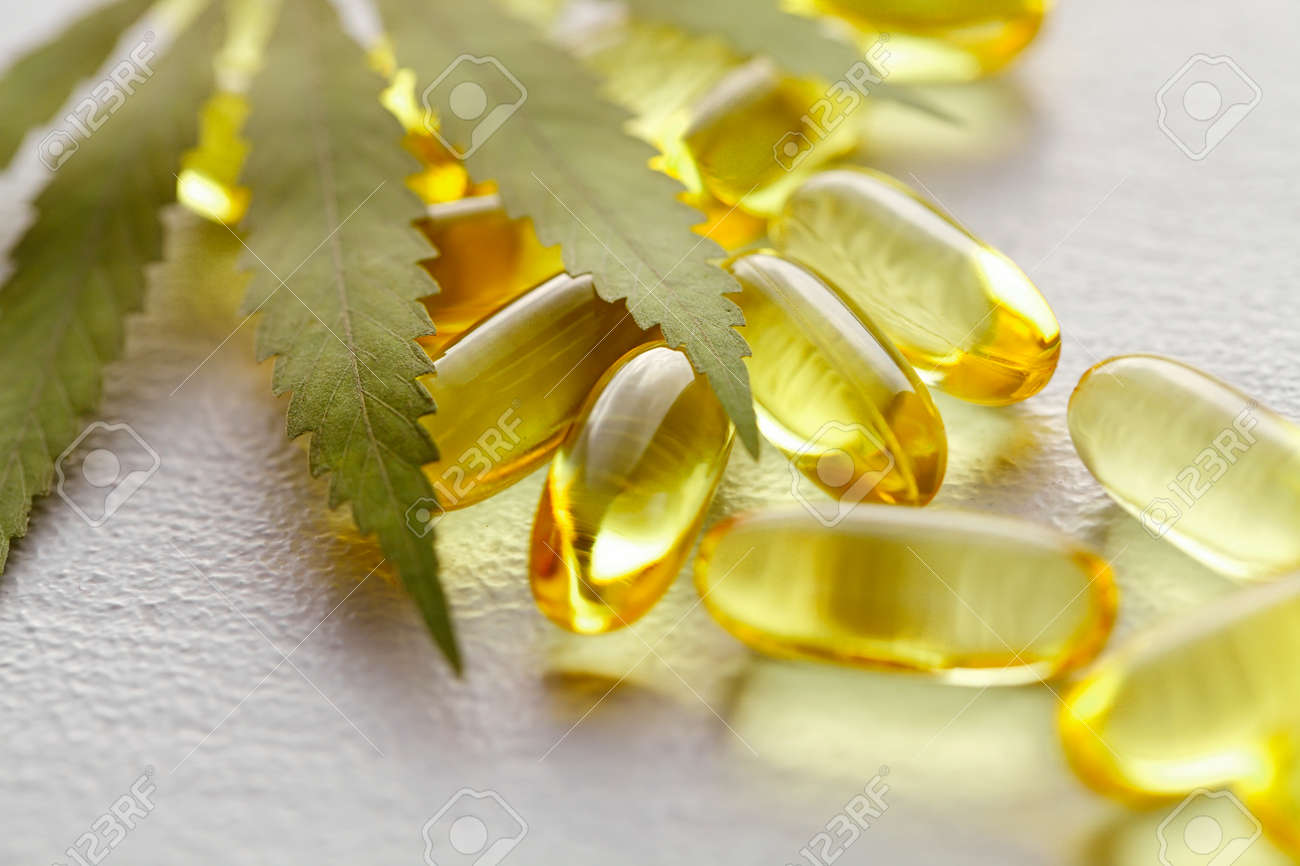 Cannabis Hemp Oil or CBD Oil Capsules, Food Organic Food Supplements. Alternative medicine concept. Cosmetics and skin care products - 169732252 Cannabis Hemp Oil or CBD Oil Capsules, Food Organic Food Supplements. Alternative medicine concept. Cosmetics and skin care products - 169732252