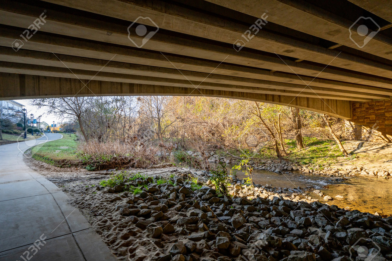 Under a bridge by the Little Sugar Creek NC USA - 161257974 Under a bridge by the Little Sugar Creek NC USA - 161257974
