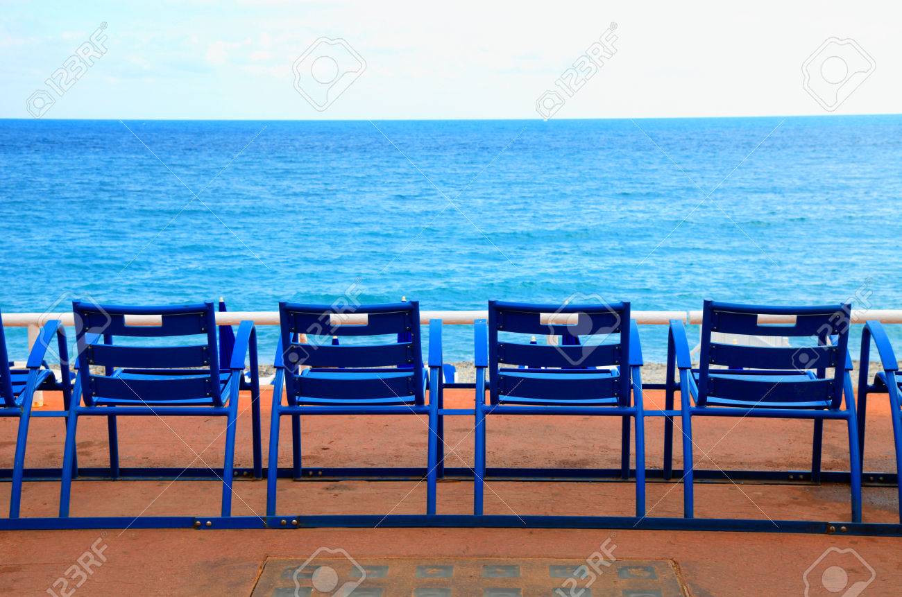 https://previews.123rf.com/images/felker/felker1310/felker131000007/23026825-blue-empty-chairs-on-promenade-des-anglais-nice-france.jpg