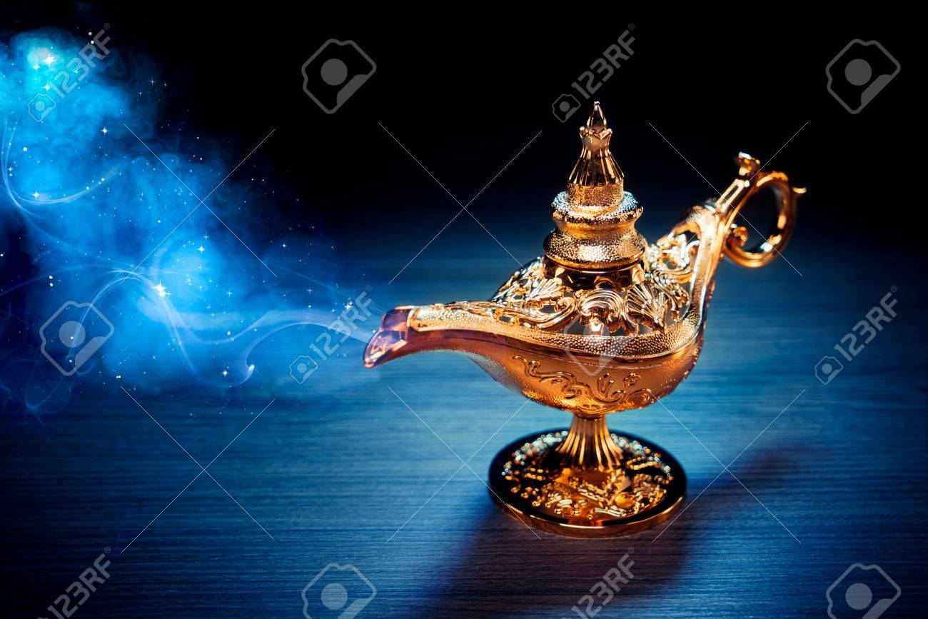 Magic Genie Lamp With Smoke On A Dark Background Stock Photo, Picture and  Royalty Free Image. Image 75333398., image size:1300x867
