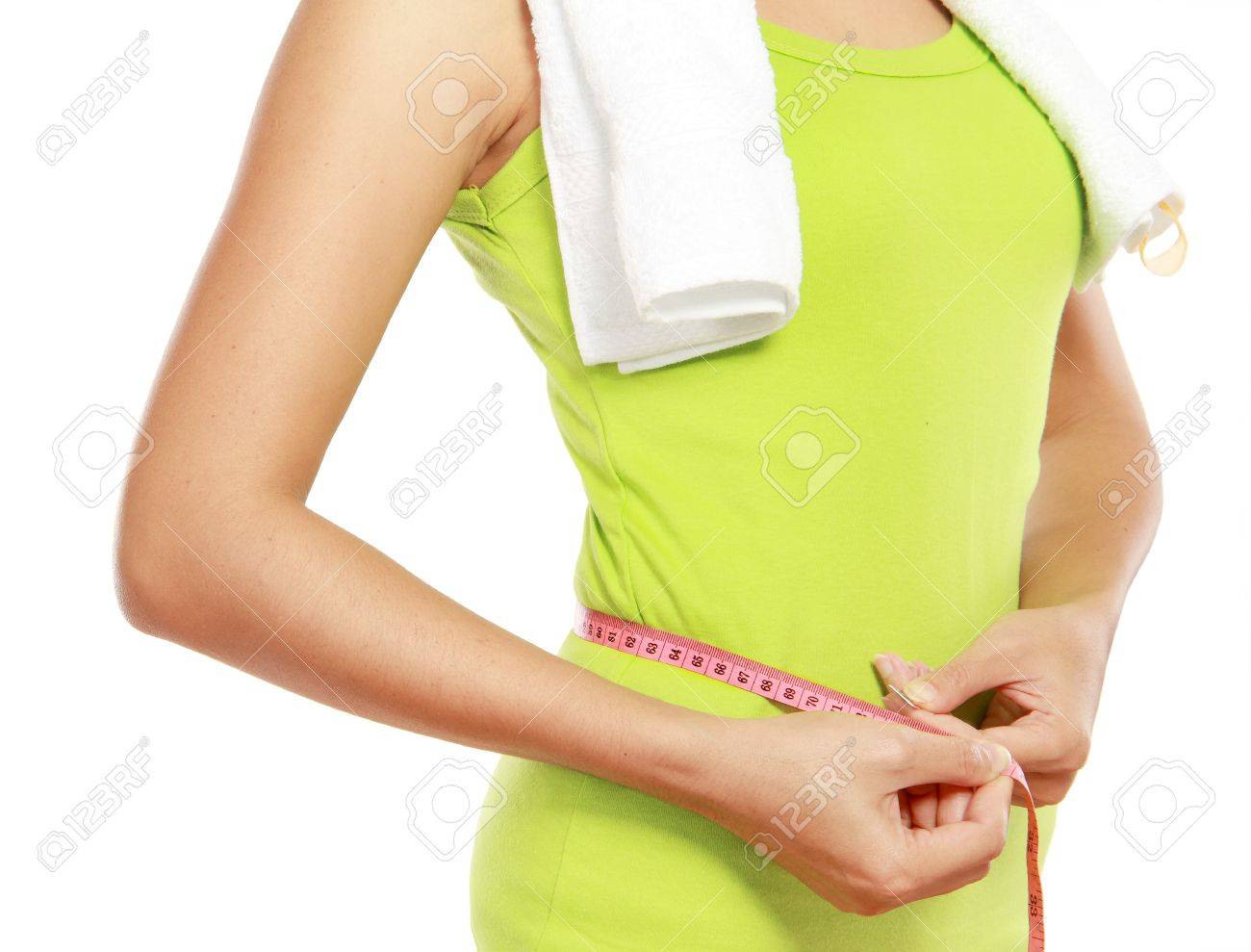close up of slim female body with measure tape around her body - 12371641 close up of slim female body with measure tape around her body - 12371641