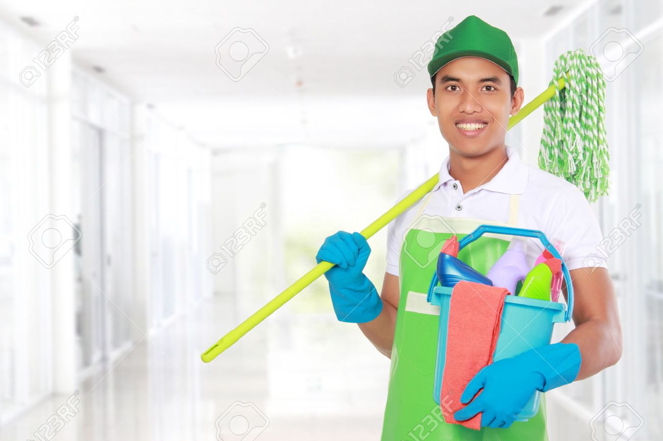 Cleaning The House portrait of young man with cleaning equipment ready to clean Cleaning The House portrait of young man with cleaning equipment ready to clean