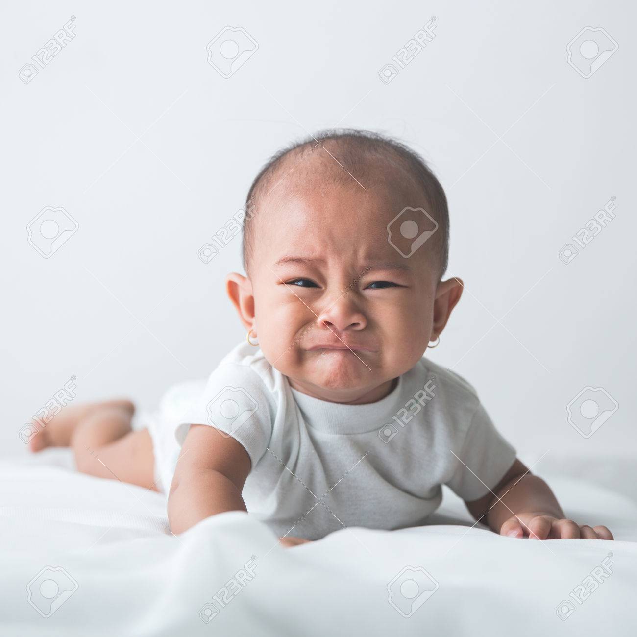 portrait of unhappy baby crying out loud - 52729466 portrait of unhappy baby crying out loud - 52729466