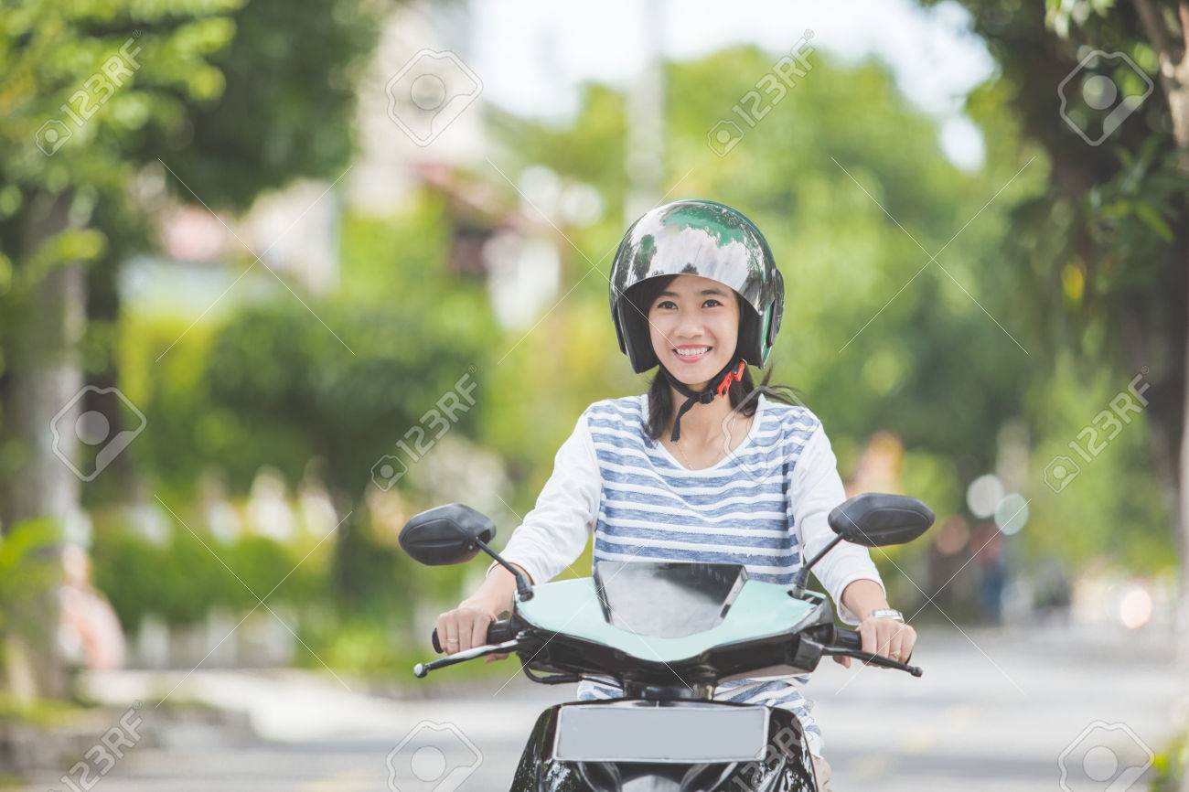 beautiful girl riding motorcycle