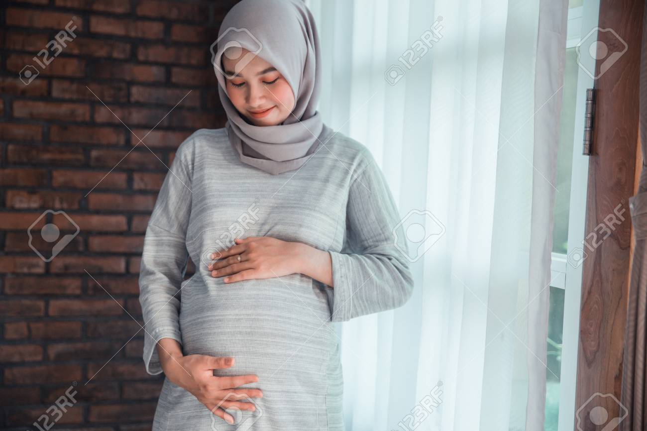 muslim pregnant woman asian - 122200308 muslim pregnant woman asian - 122200308