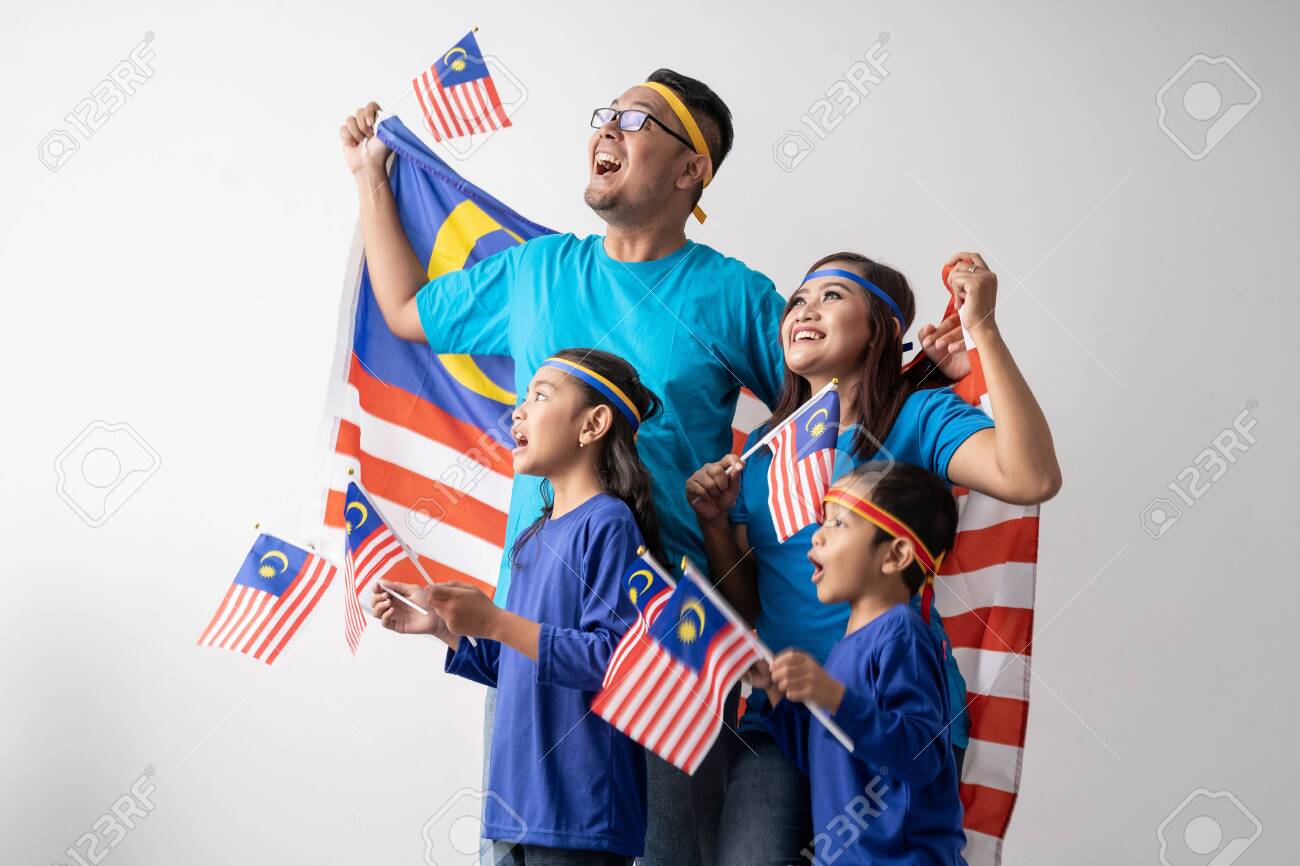 malaysia family with attributes and flag celebrating - 128977752 malaysia family with attributes and flag celebrating - 128977752