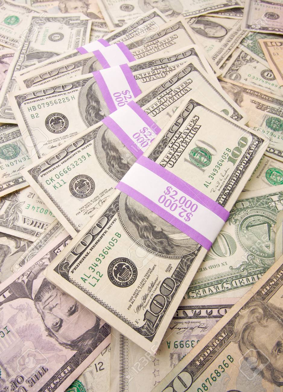 stacks of unites states money background contains recent currency currency designs