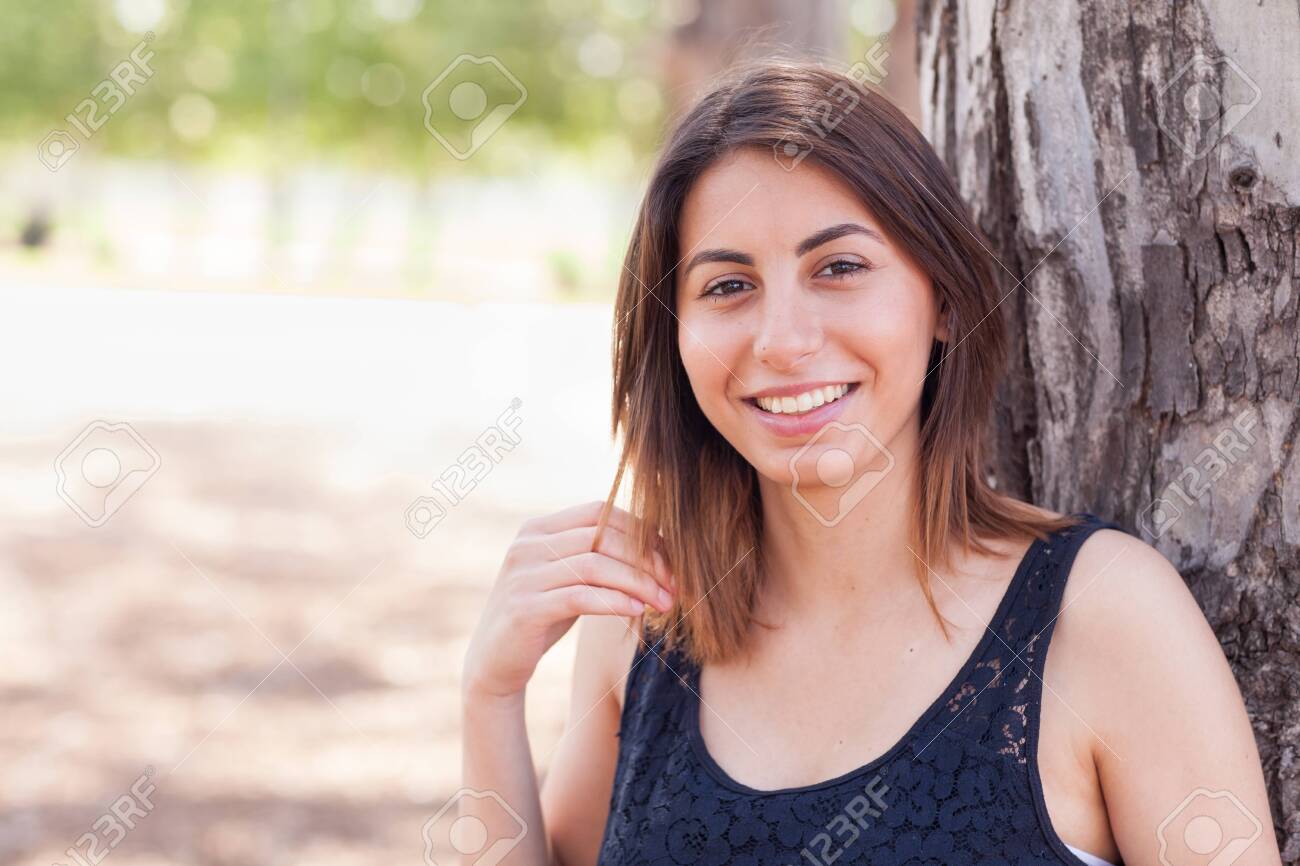 Beautiful Young Ethnic Woman Portrait Outside. - 121426473 Beautiful Young Ethnic Woman Portrait Outside. - 121426473