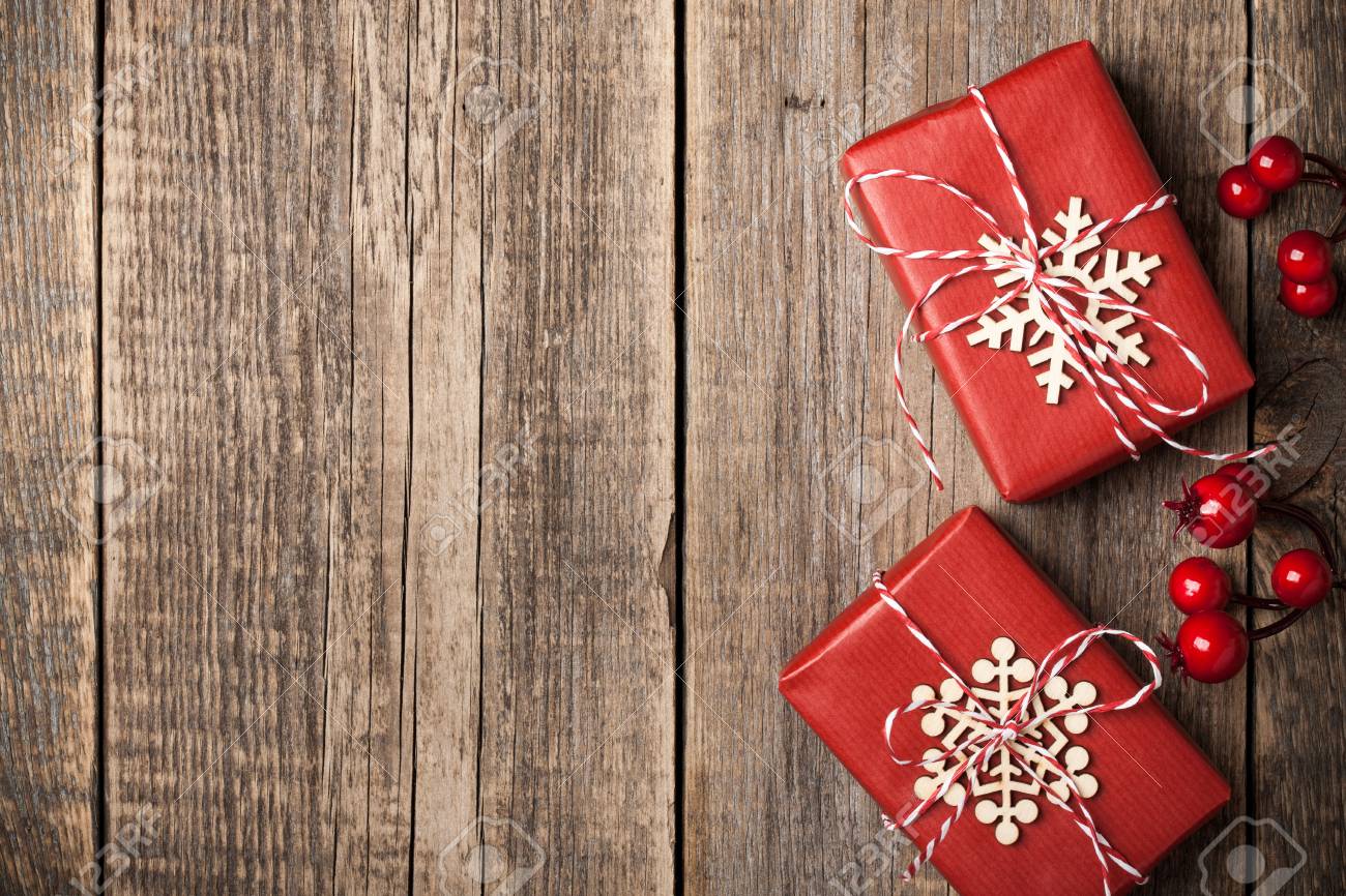 christmas gift boxes on wooden background stock photo picture and