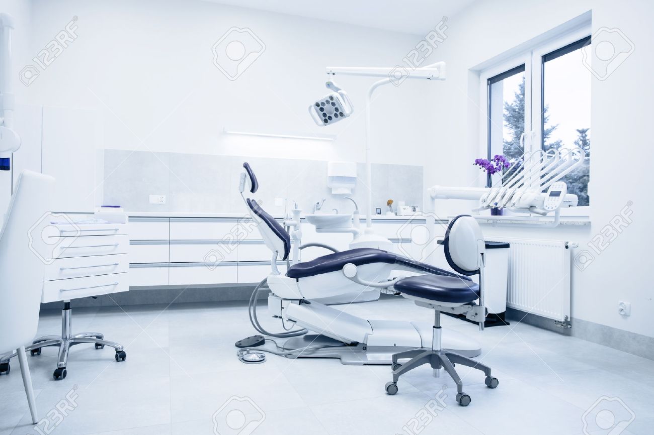 Modern dental practice. Dental chair and other accessories used by dentists. - 55567707 Modern dental practice. Dental chair and other accessories used by dentists. - 55567707