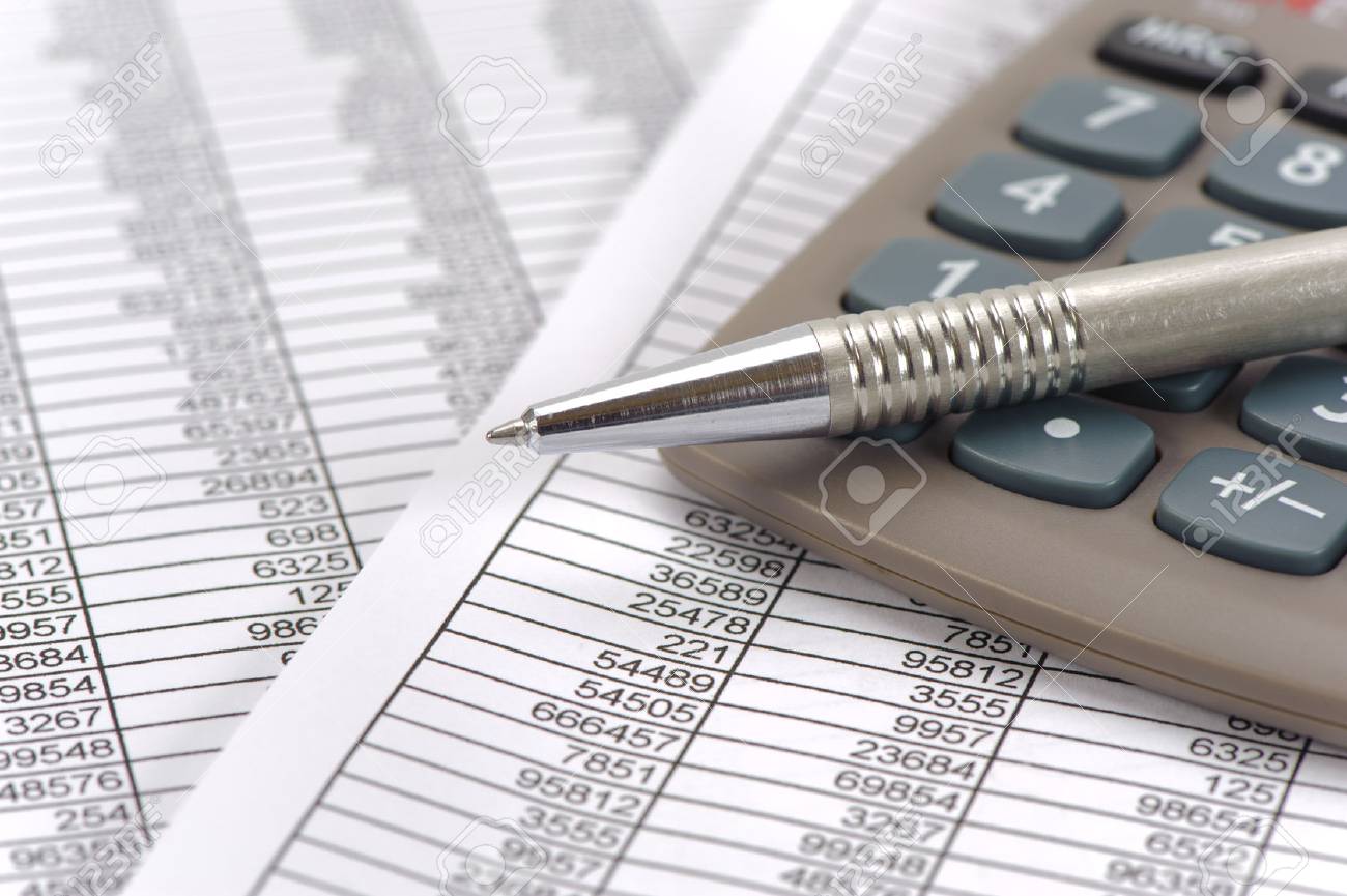 finance and budget calculation with table sheet stock photo picture