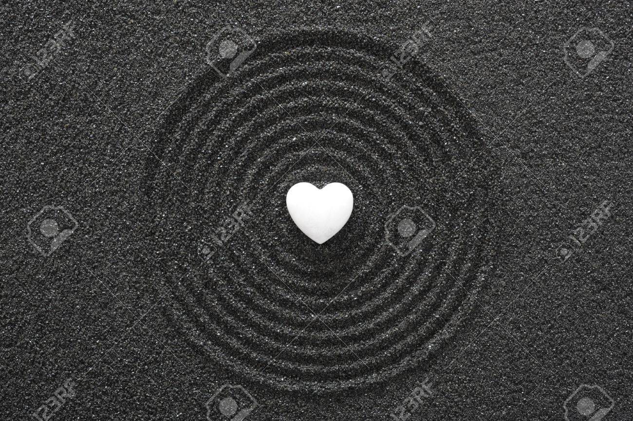 Japanese ZEN garden with white heart in raked sand - 56032586 Japanese ZEN garden with white heart in raked sand - 56032586