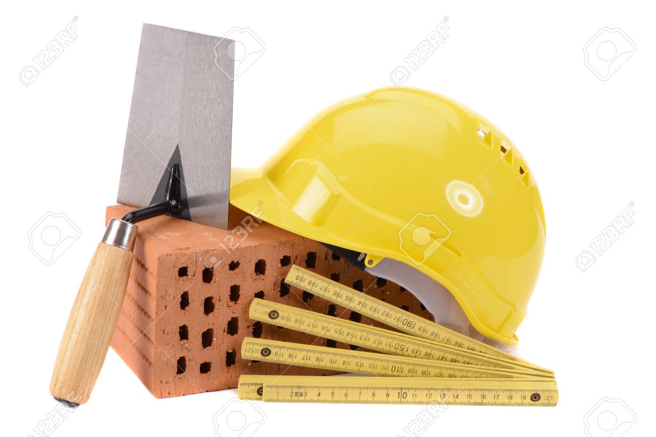 house construction with brick, tools, plan and model house - 101558734 house construction with brick, tools, plan and model house - 101558734