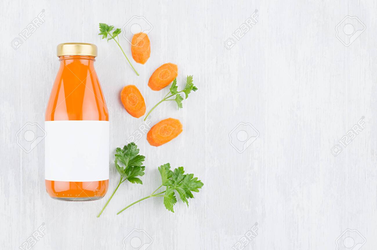 Download Organic Orange Carrot Juice In Glass Bottle With Blank Label Stock Photo Picture And Royalty Free Image Image 149499698