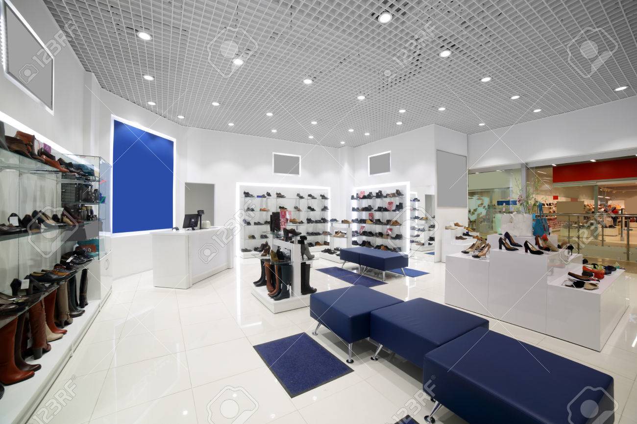 bright and fashionable interior of shoe store in modern mall - 34076188 bright and fashionable interior of shoe store in modern mall - 34076188