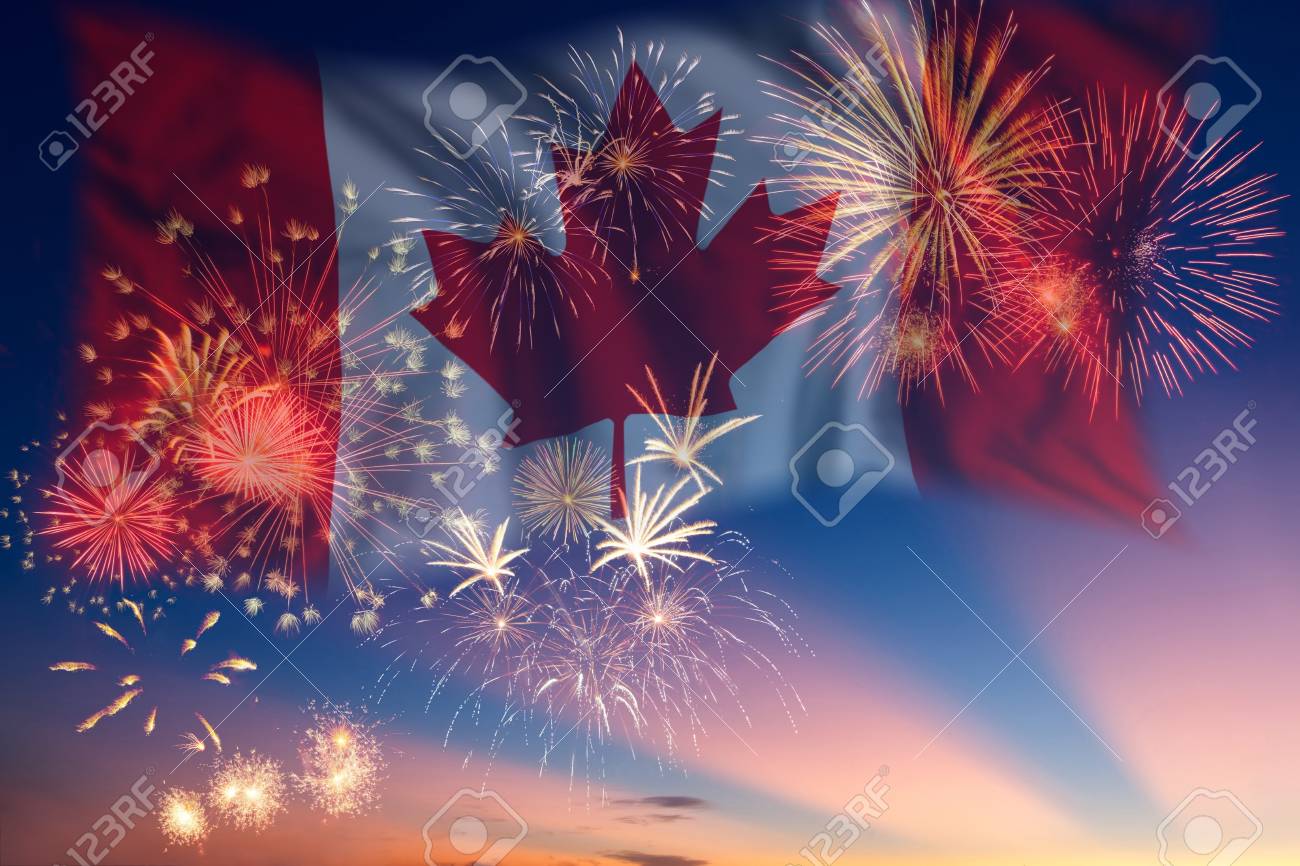 holiday sky with fireworks and flag of canada independence day fireworks and flag