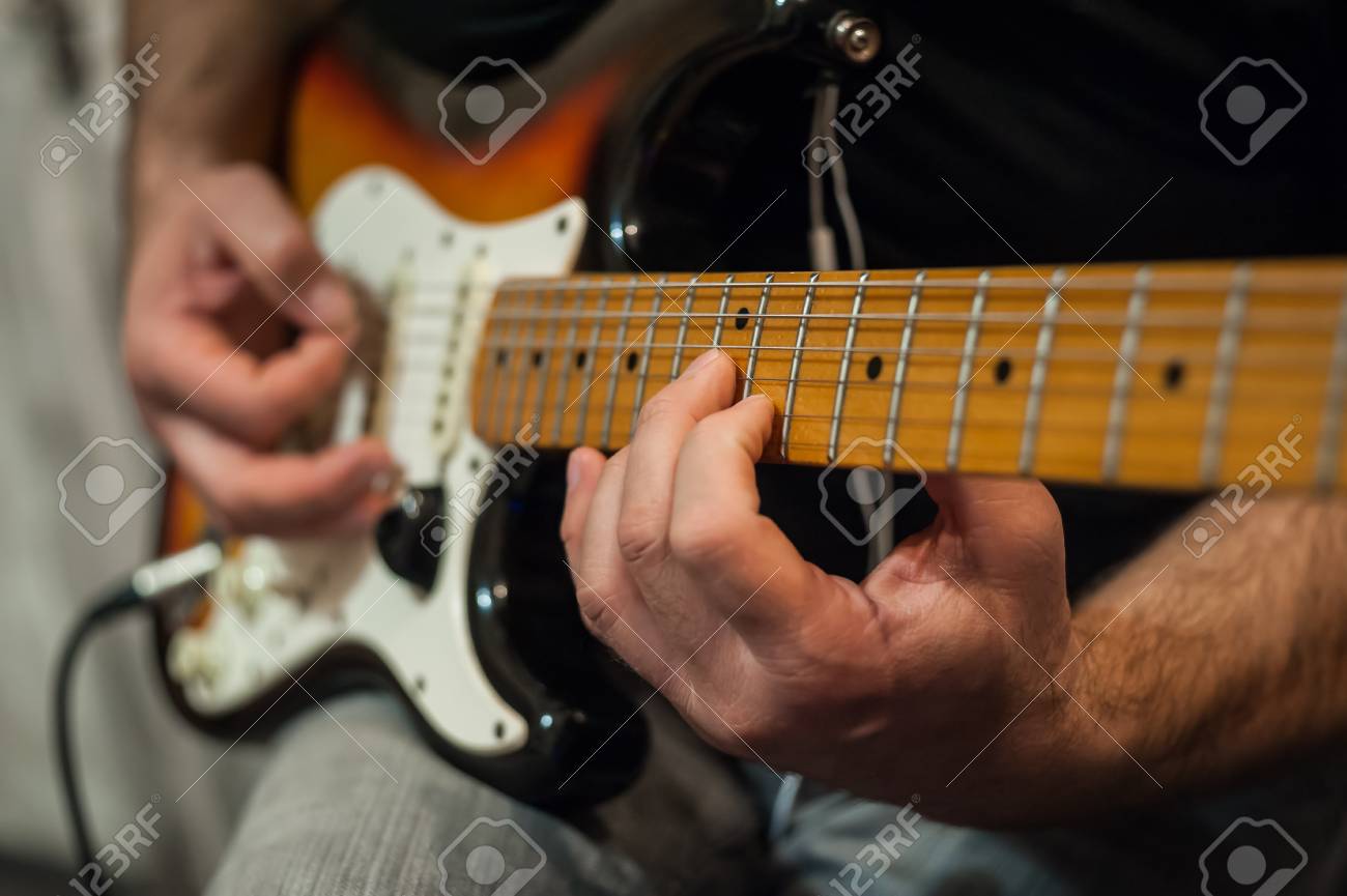 Closeup Fingers Of Guitar Player Music Background Selective Focus Stock P O 114068710 Closeup Fingers Of Guitar Player Music Background Selective Focus Stock P O 114068710